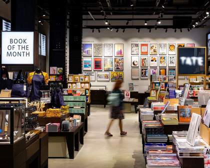A person walking through a shop